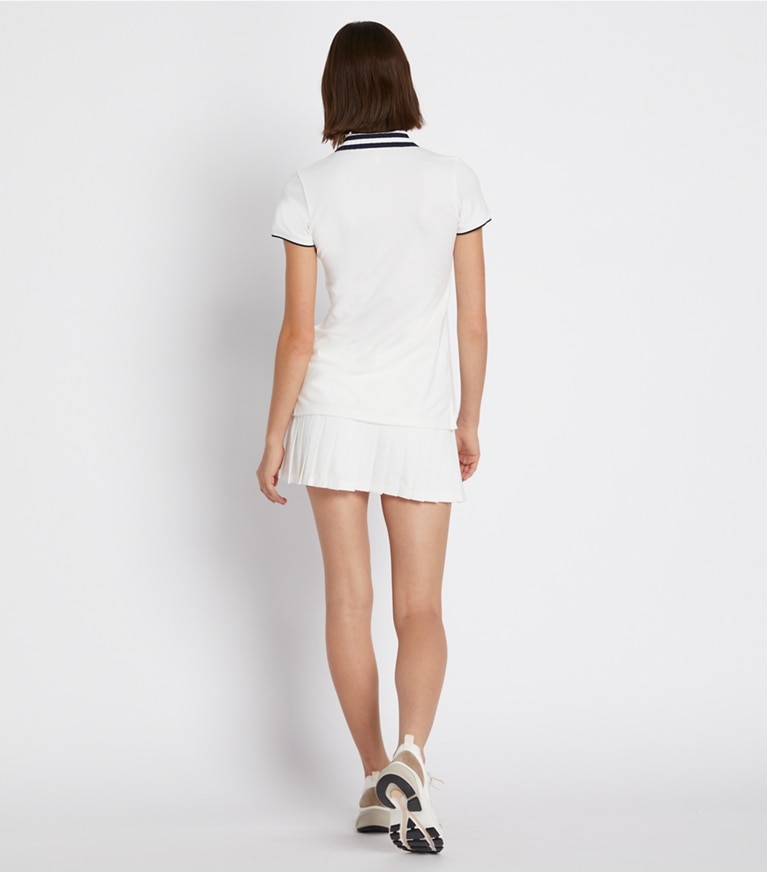Tory Sport designer oberteile Performance-Poloshirt aus Piqué mit Plisseekragen in Snow White/Tory Navy front