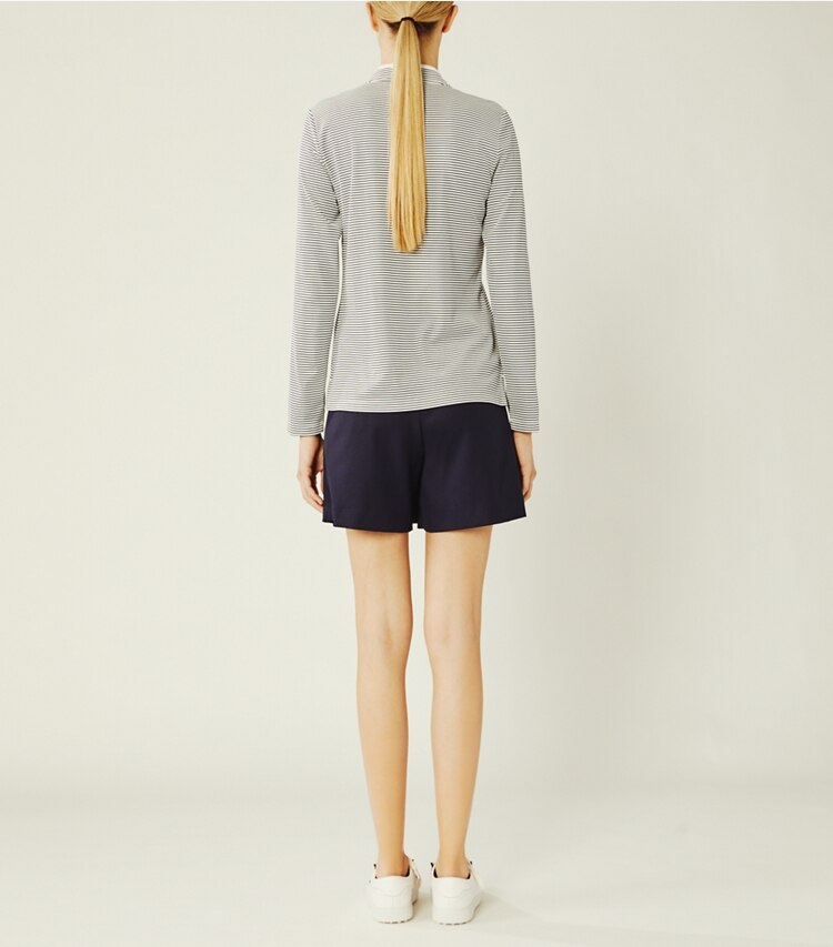 Tory Sport designer tops Performance Striped Half-Zip Pullover in Snow White/Tory Navy Pin Stripe on model back