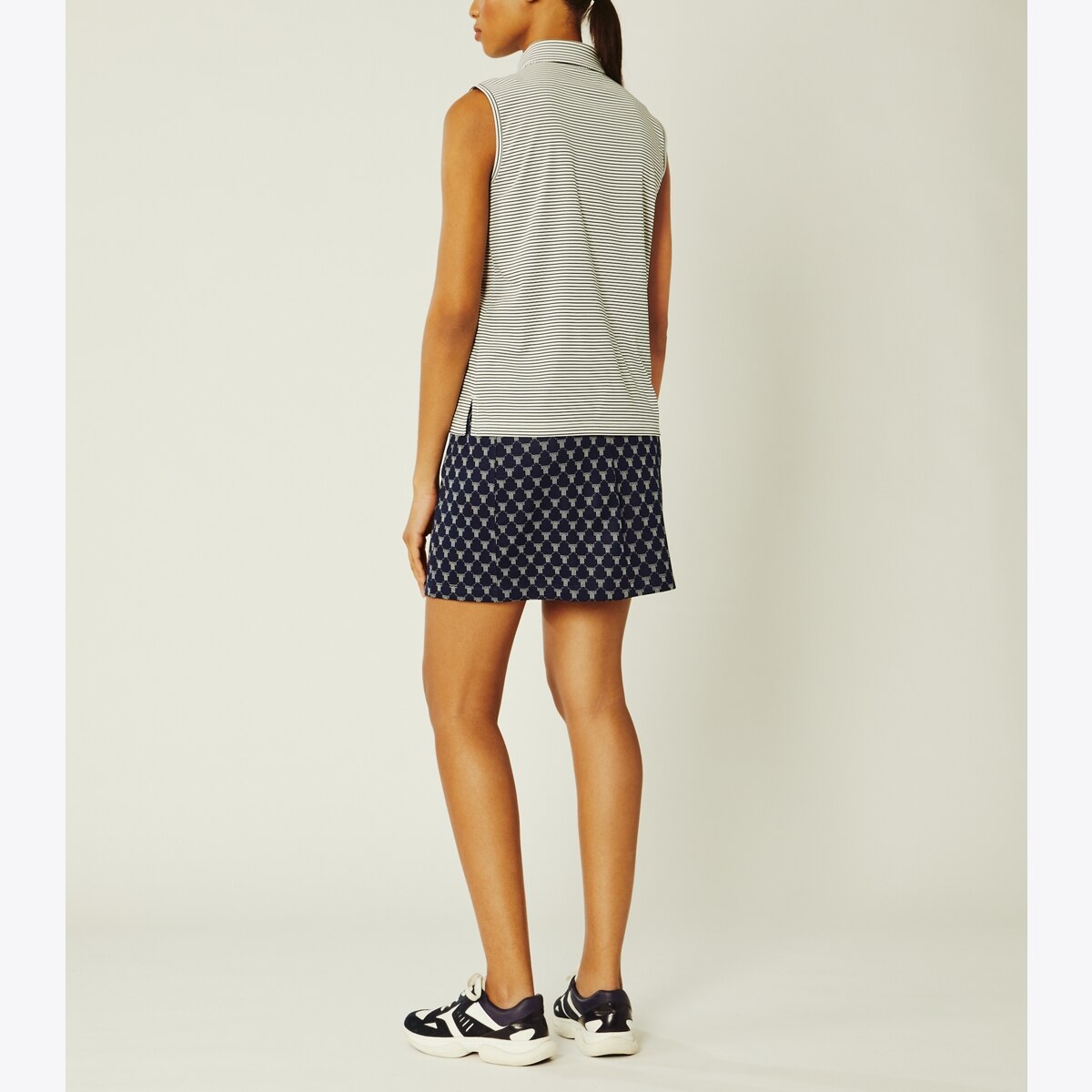 Performance Striped Sleeveless Ruffle Polo: Women 