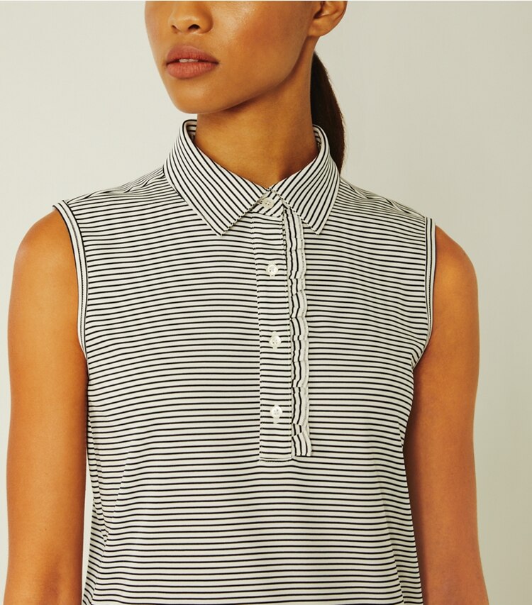 Tory Sport designer tops Performance Striped Sleeveless Ruffle Polo in Snow White/Tory Navy Pin Stripe on model detail