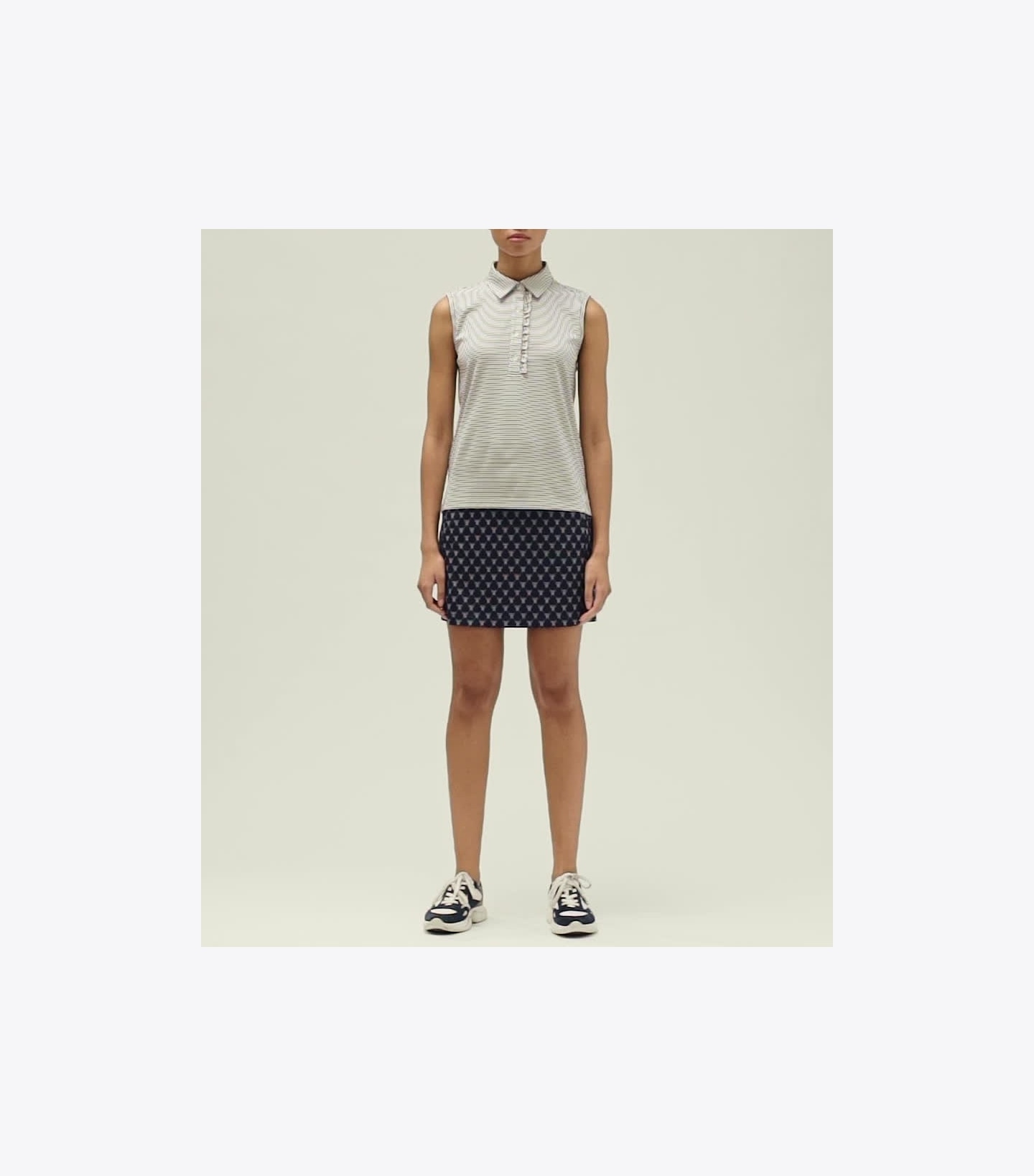 Performance Striped Sleeveless Ruffle Polo