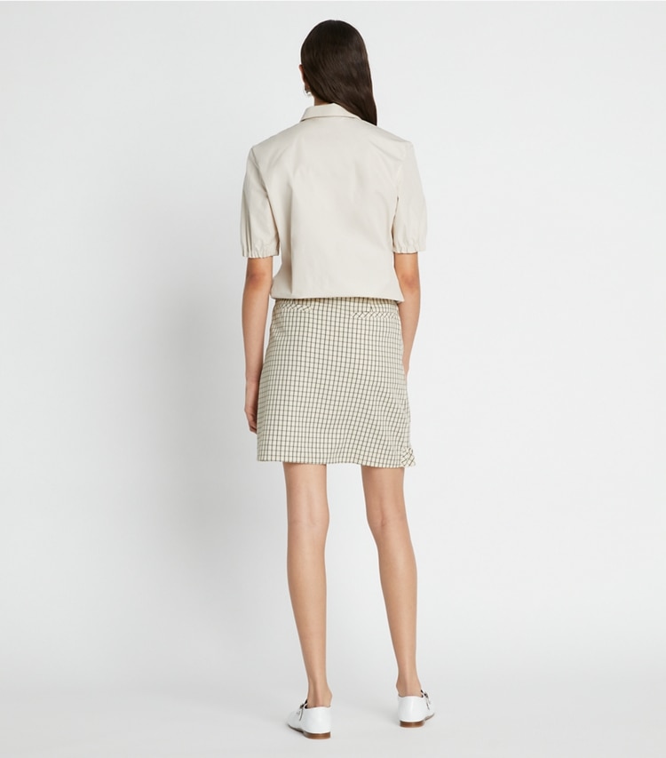 Tory Sport designer bottoms Performance Twill Golf Skirt in Sesame Petite Plaid on model back