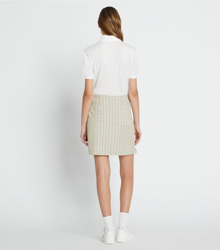 Tory Sport designer bottoms Performance Twill Golf Skirt in New Ivory Pin Stripe Plaid on model back