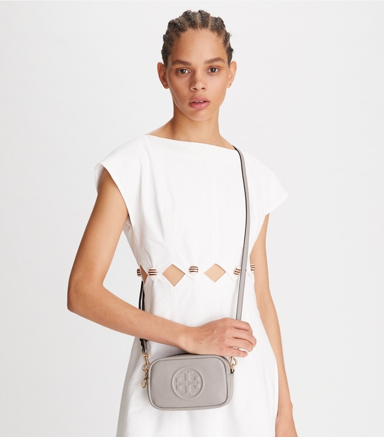 Tory Burch designer crossbody bags Perry Bombé Mini Bag in Bay Gray accessory on model