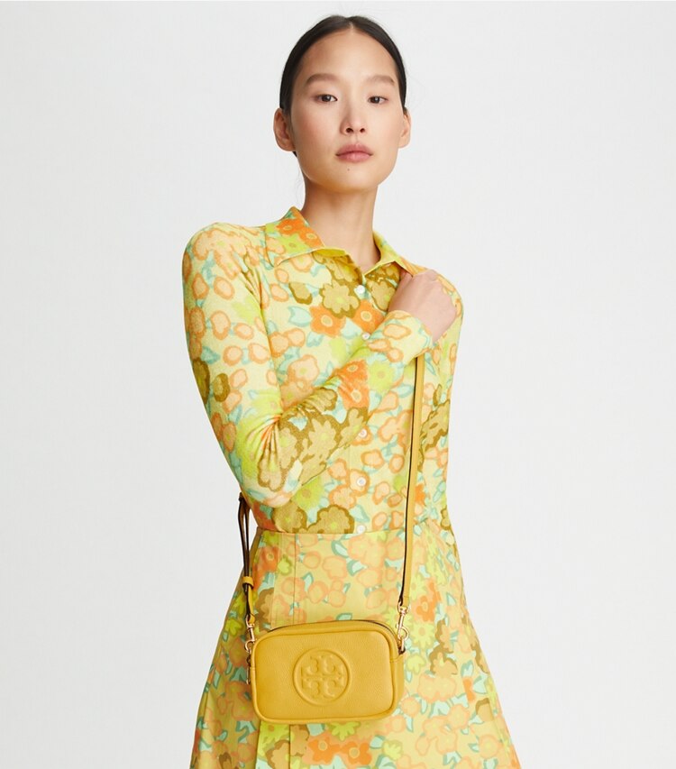 Tory Burch designer crossbody bags Perry Bombé Mini Bag in Golden Sunset accessory on model