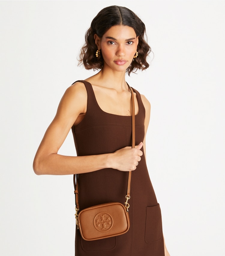 Tory Burch designer crossbody bags Perry Bombé Mini Bag in Light Umber accessory on model