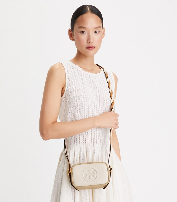 Tory Burch designer crossbody bags Perry Bombé Twisted-Strap Mini Bag in NEW CREAM / LONGAN accessory on model