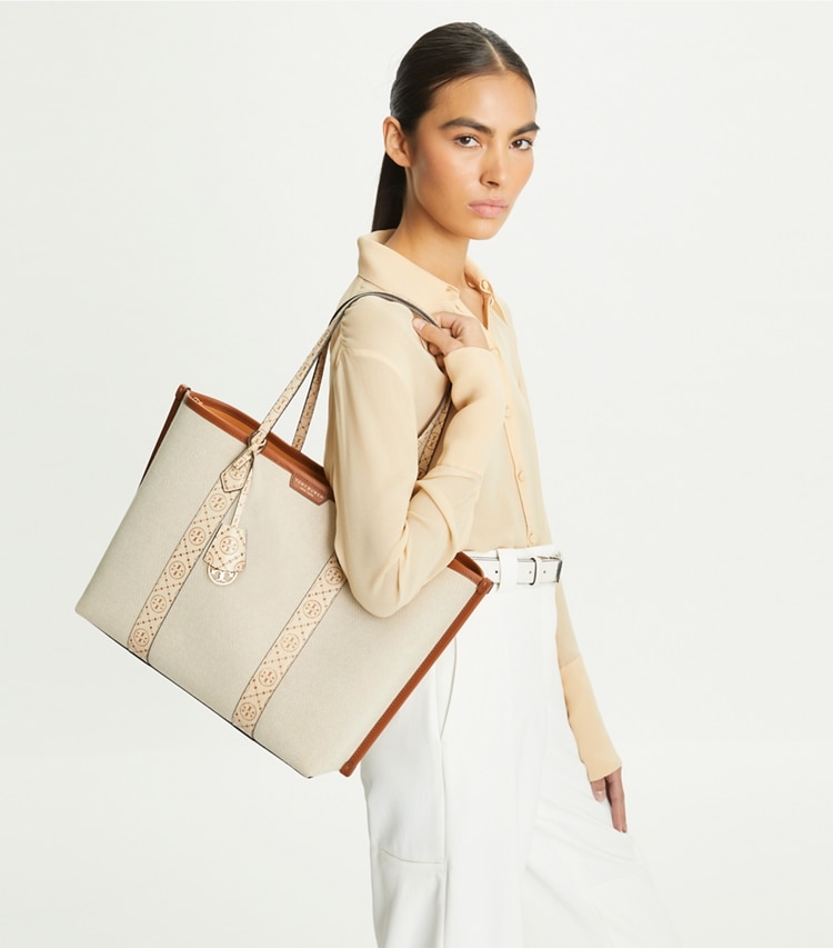 Tory Burch designer tote bags Perry Canvas Triple-Compartment Tote in New Cream accessory on model