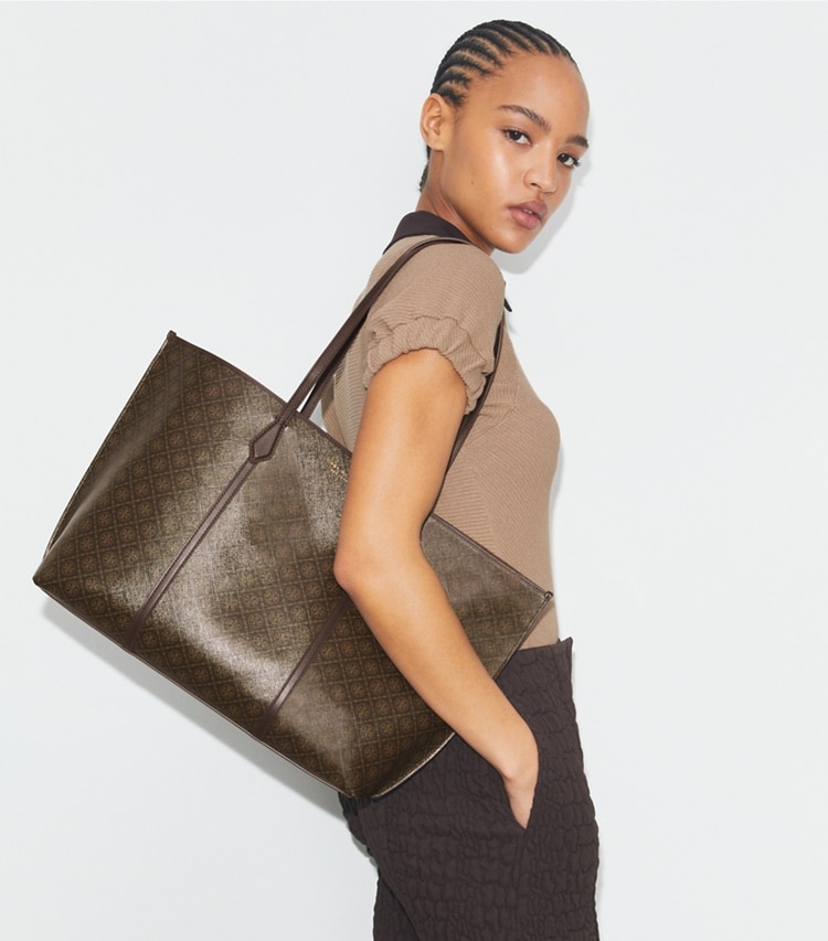 Tory Burch designer tote bags Perry Coated Canvas Tote in French Press accessory on model