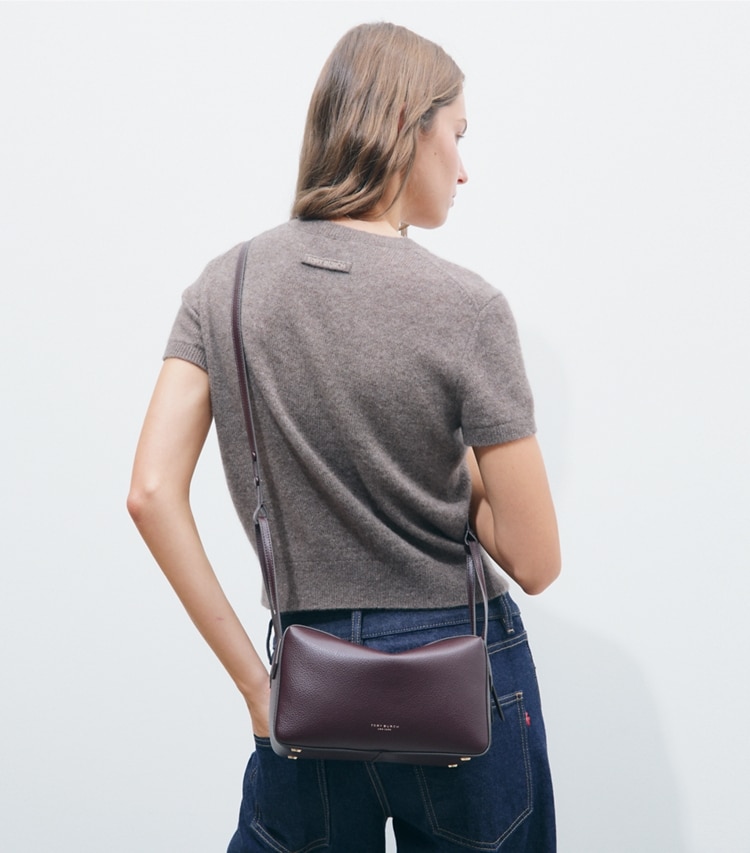 Tory Burch designer crossbody bags Perry Crossbody in Dark Carmine additional on model