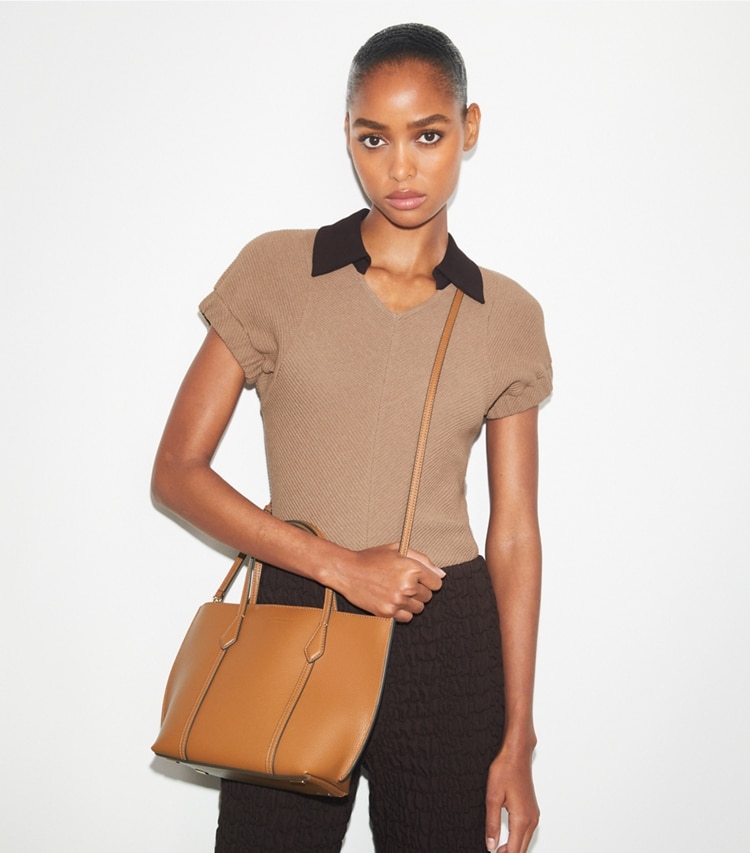 Tory Burch designer crossbody bags Perry Mini Tote in Autumn Brown accessory on model