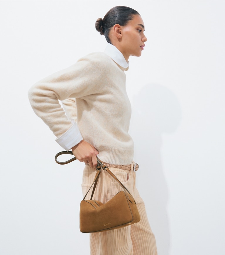 Tory Burch designer crossbody bags Perry Suede Crossbody in Umber additional on model