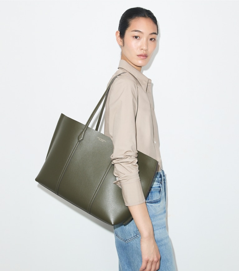 Tory Burch designer tote bags Perry Tote in Dark Olive accessory on model