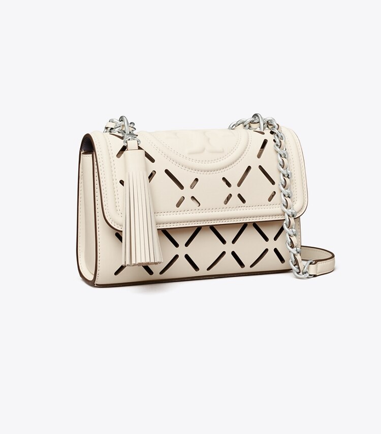 Tory Burch designer sacs porté épaule Petit sac à bandoulière convertible Fleming à motif losanges perforé dans NEW IVORY / DARK LOTUS angle