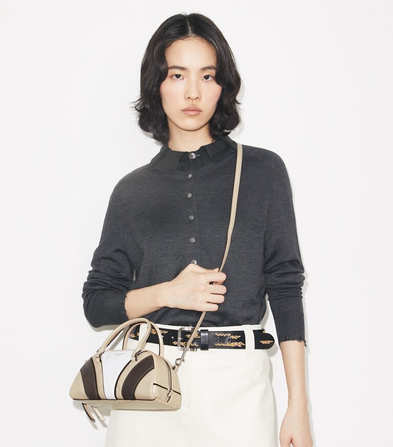 Tory Burch designer sacs à bandoulière Petit sac bowling matelassé Moto dans Multi accessoire sur le modèle