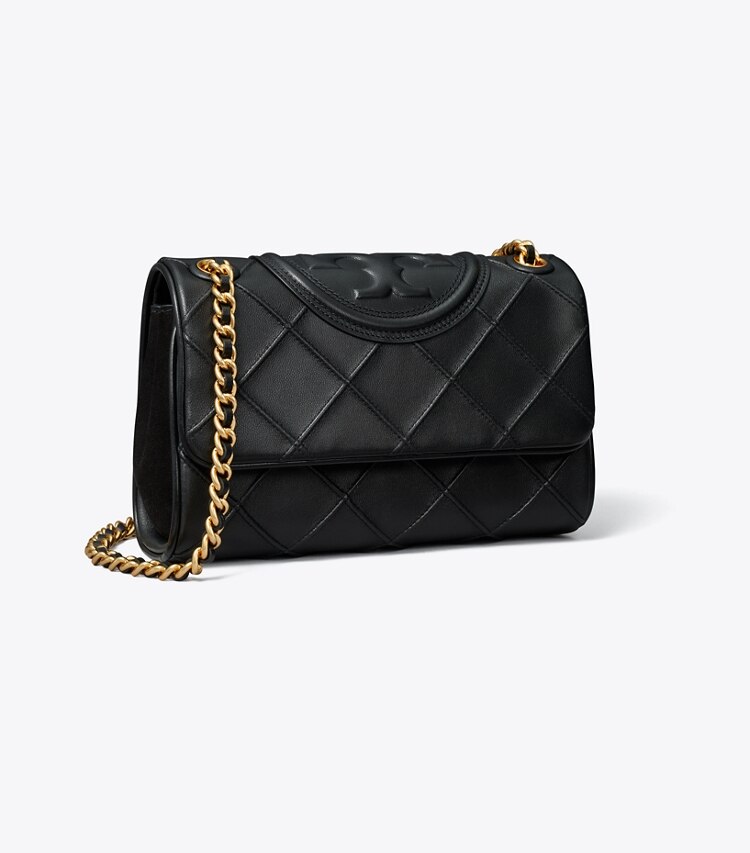 Tory Burch designer sacs porté épaule Petit sac porté épaule convertible Fleming en cuir souple in Black angle