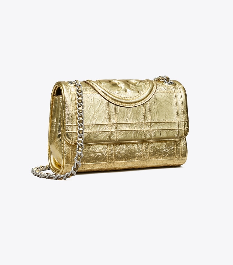 Tory Burch designer sacs porté épaule Petit sac porté épaule convertible Fleming en cuir souple in 18 Kt Gold angle