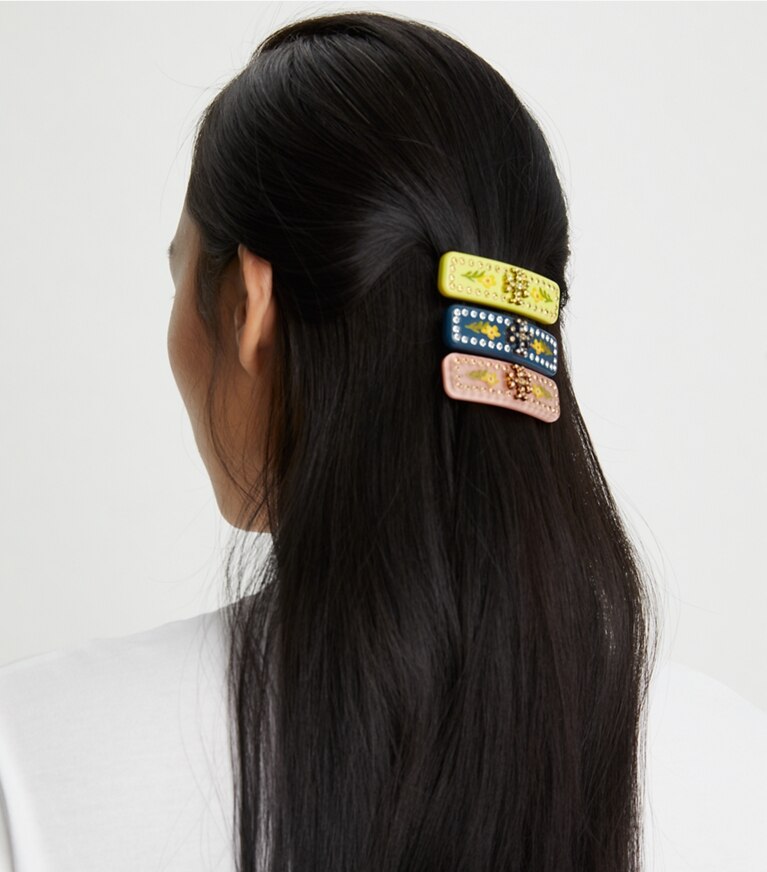 Tory Burch designer épingles à cheveux Petite barrette Roxanne à ornement in Rolled Tory Gold / Navy front