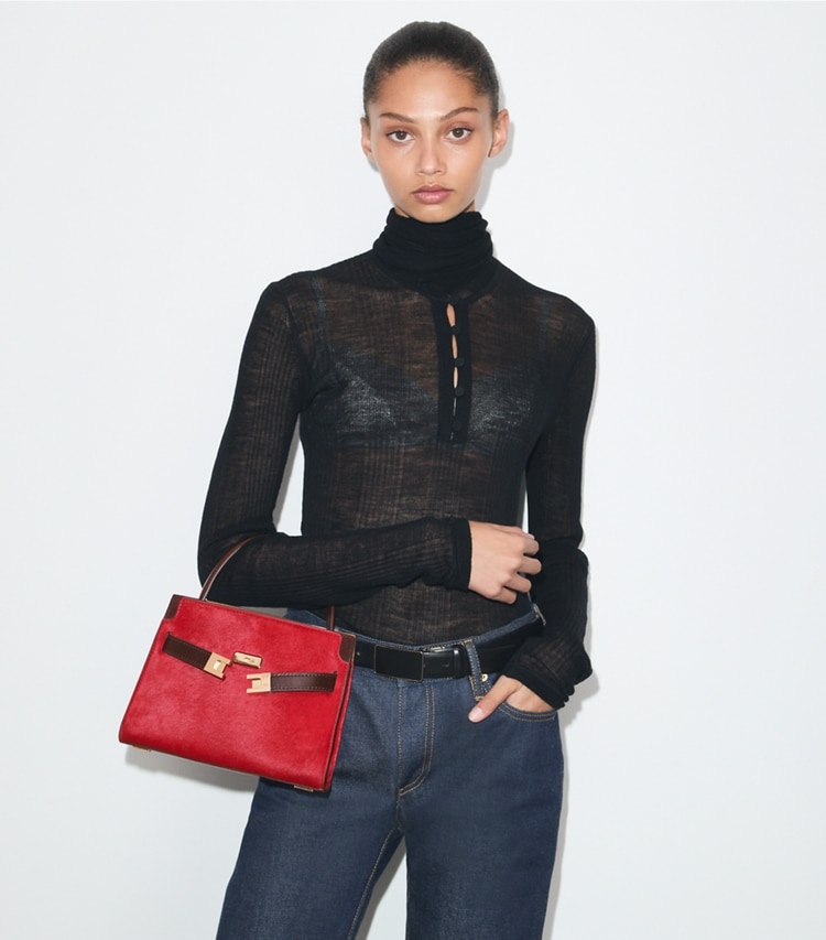 Tory Burch designer crossbody bags Petite Lee Radziwill Calf Hair Double Bag in Toucan Red accessory on model