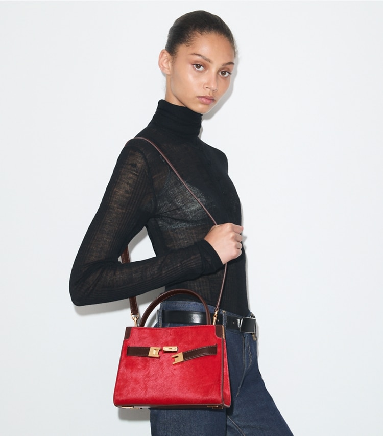 Tory Burch designer crossbody bags Petite Lee Radziwill Calf Hair Double Bag in Toucan Red additional on model