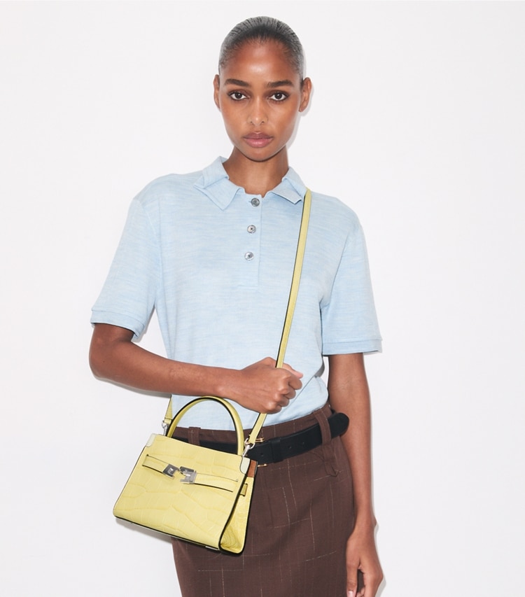 Tory Burch designer crossbody bags Petite Lee Radziwill Croc-Embossed Double Bag in Yellow Sky additional on model