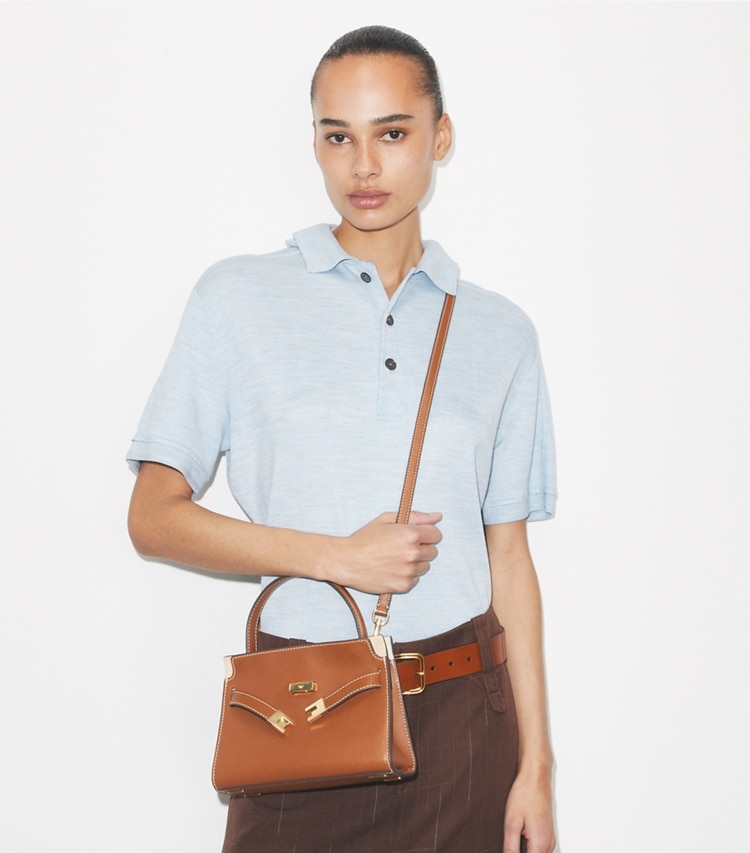 Tory Burch designer crossbody bags Petite Lee Radziwill Double Bag in Aged Tan additional on model