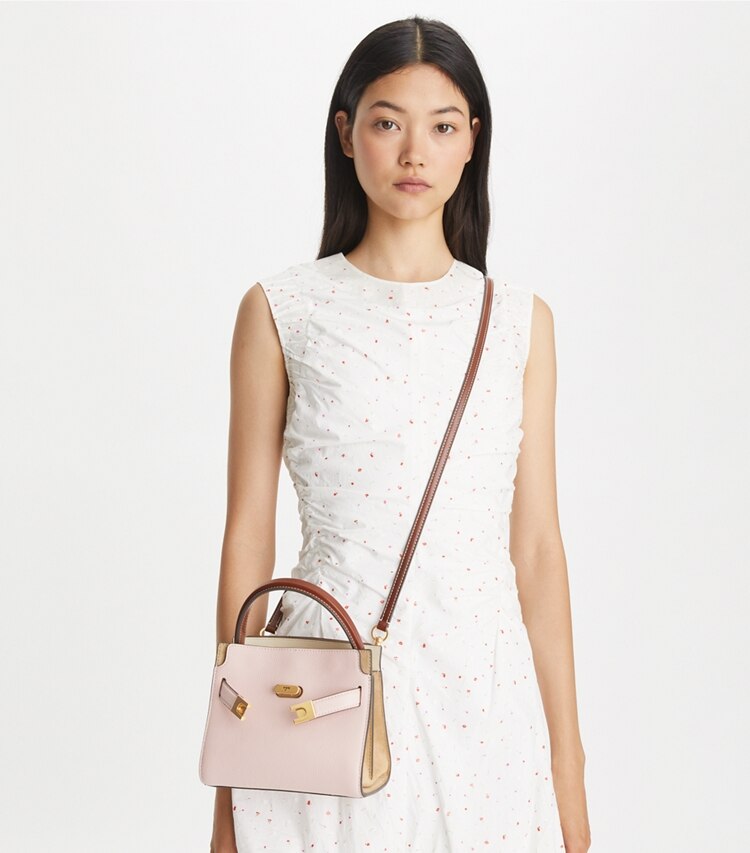 Tory Burch designer crossbody bags Petite Lee Radziwill Pebbled Double Bag in Pink Sand accessory on model