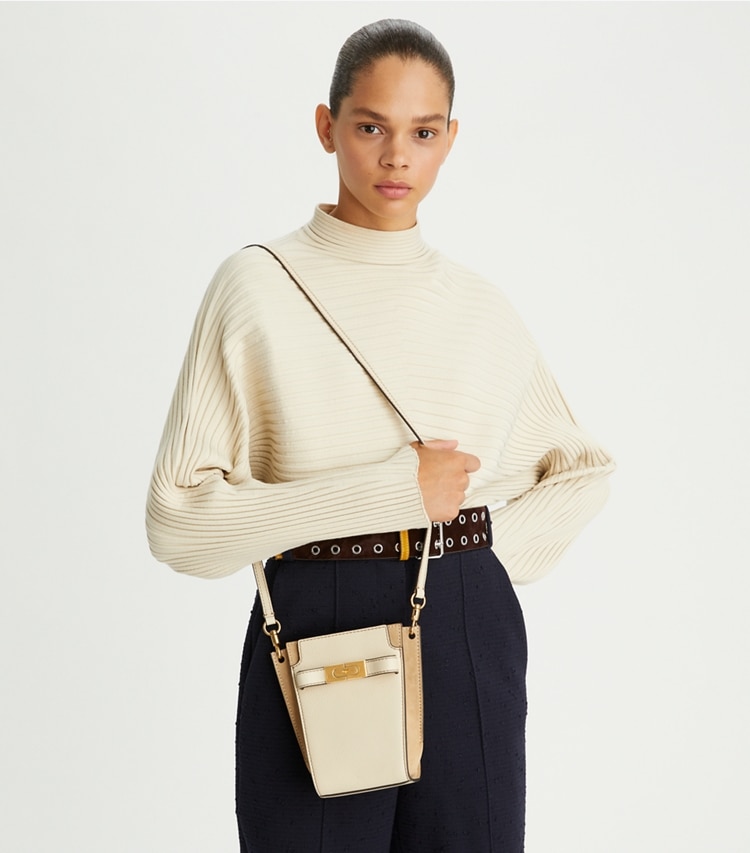 Tory Burch designer crossbody bags Petite Lee Radziwill Pebbled Double Bucket in New Moon accessory on model