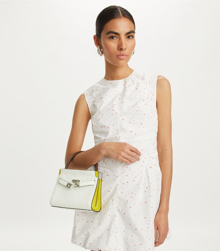 Tory Burch designer crossbody bags Petite Lee Radziwill Snake Embossed Double Bag in Blanc accessory on model