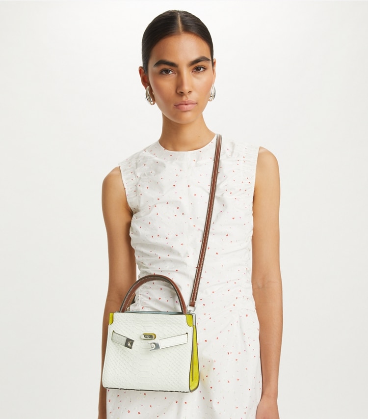 Tory Burch designer crossbody bags Petite Lee Radziwill Snake Embossed Double Bag in Blanc additional on model