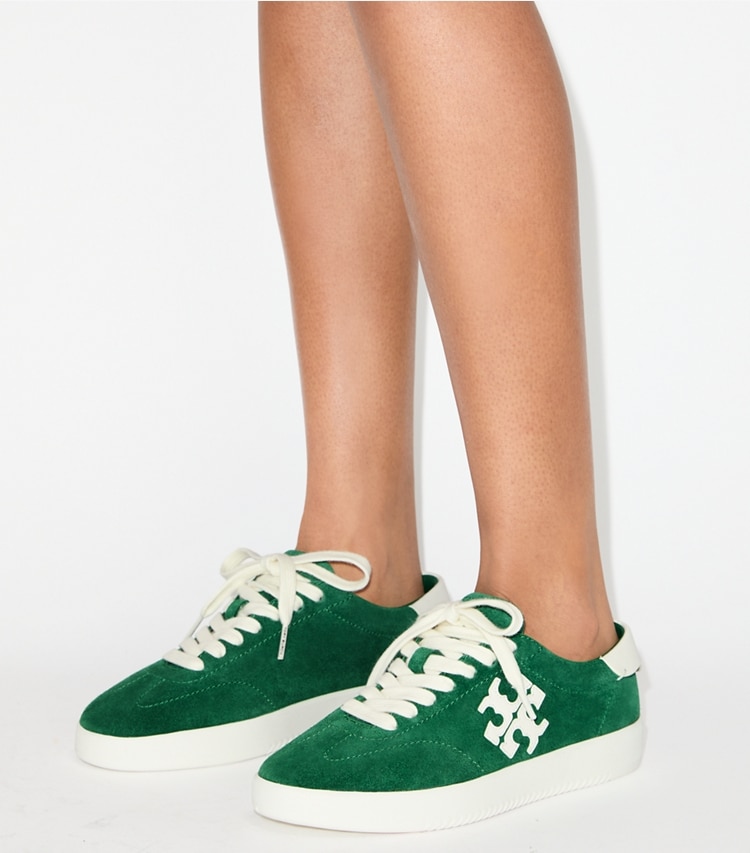 Tory Burch designer sneakers Phoenix Sneaker in GRASS / CREAM accessory on model