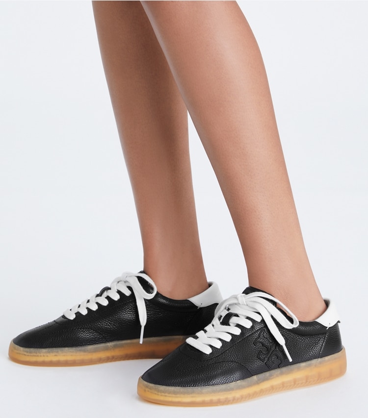 Tory Burch designer sneakers Phoenix Sneaker in PERFECT BLACK / WHITE / WHITE additional on model