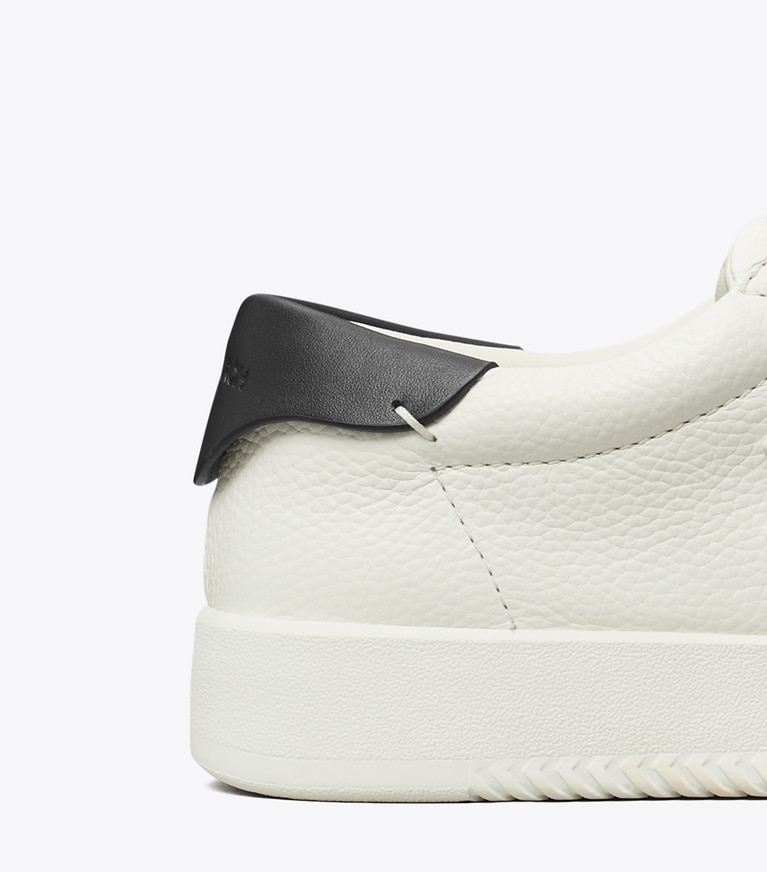 Tory Burch designer sneakers Phoenix Sneaker in CREAM / PERFECT BLACK detail