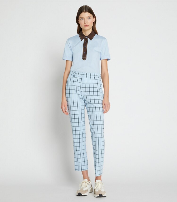 Tory Sport designer tops Pick Stitch Contrast Collar Polo in Ice Flow on model front