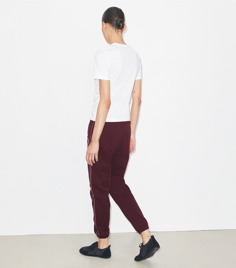 Tory Burch designer bottoms Pick Stitch Heart French Terry Sweatpant in Dark Merlot on model back