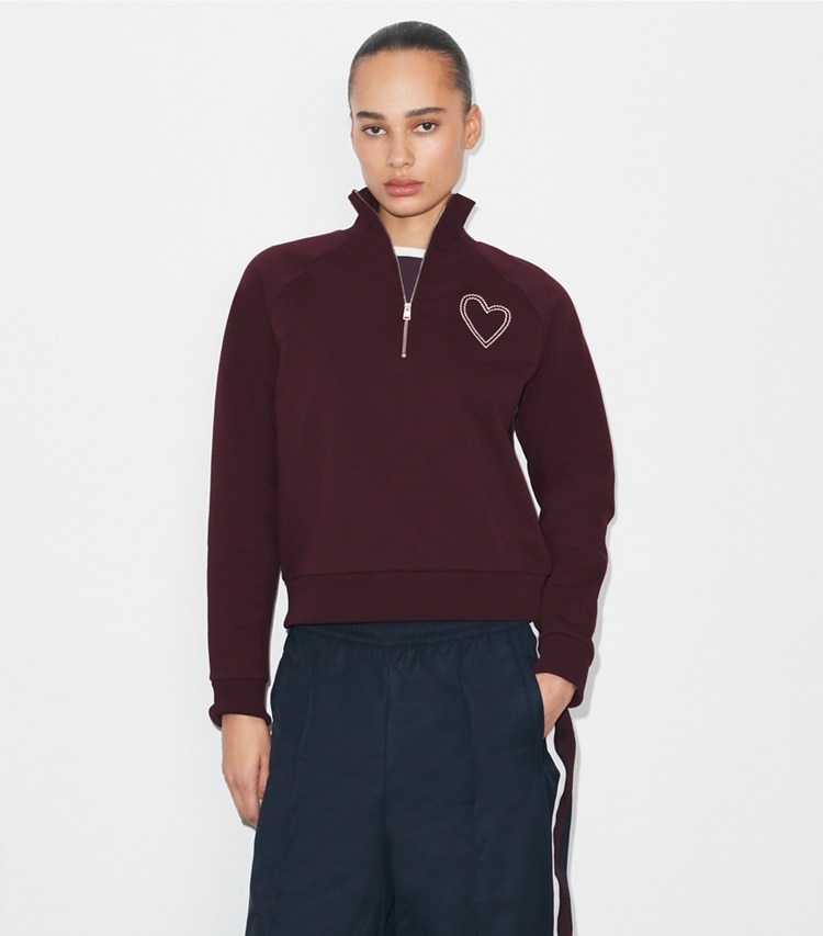 Tory Burch designer sweaters Pick Stitch Heart French Terry Sweatshirt in Dark Merlot on model detail