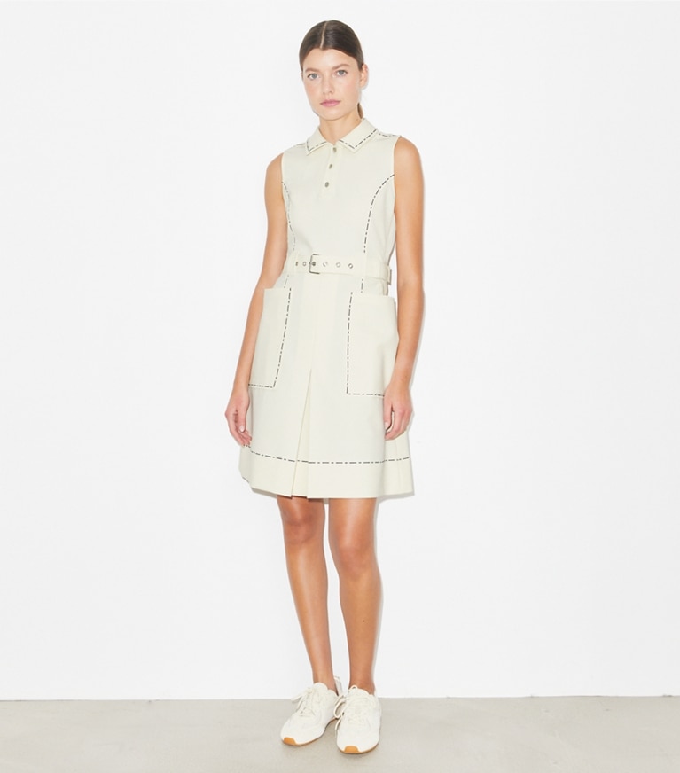 Tory Burch designer dresses Pick Stitch Stretch Golf Dress in New Ivory on model front