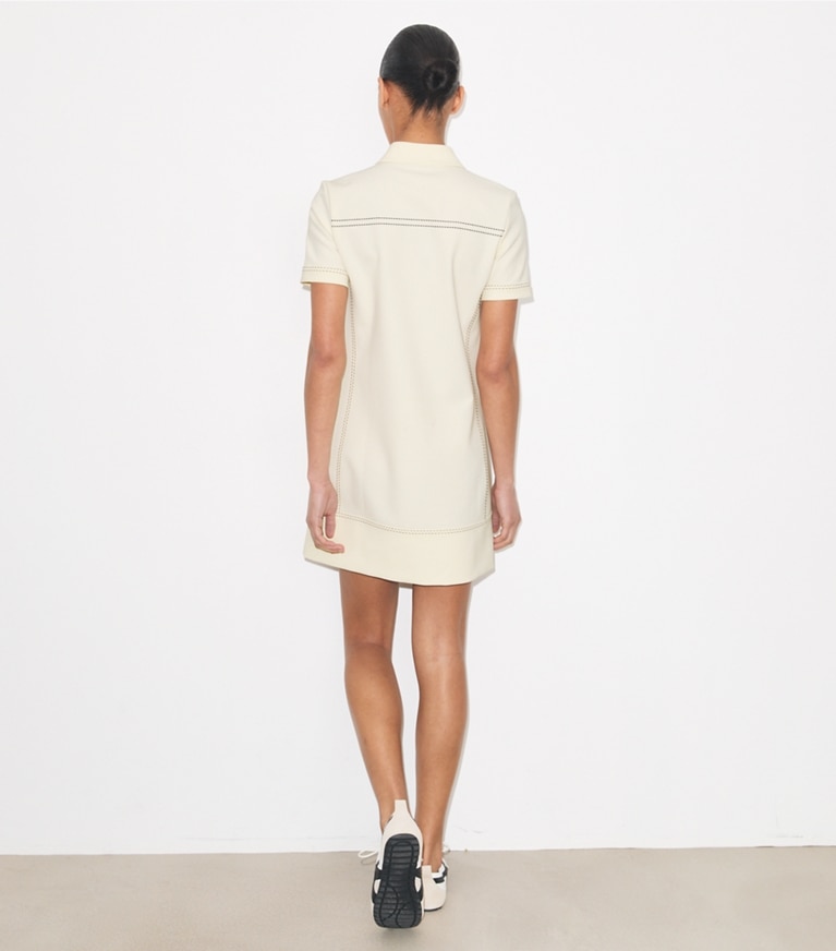 Tory Burch designer dresses Pick Stitch Stretch Polo Dress in New Ivory on model back