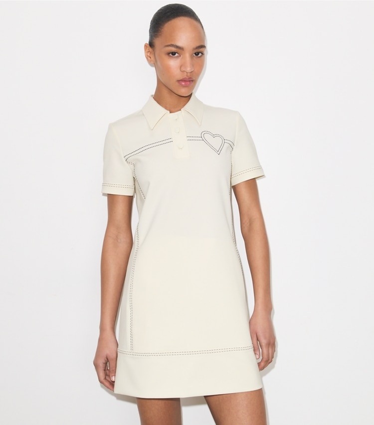 Tory Burch designer dresses Pick Stitch Stretch Polo Dress in New Ivory on model detail
