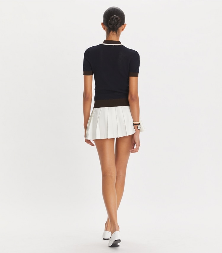 Tory Sport designer ボトムス ピックステッチ プリーツスカート in Snow White on model back