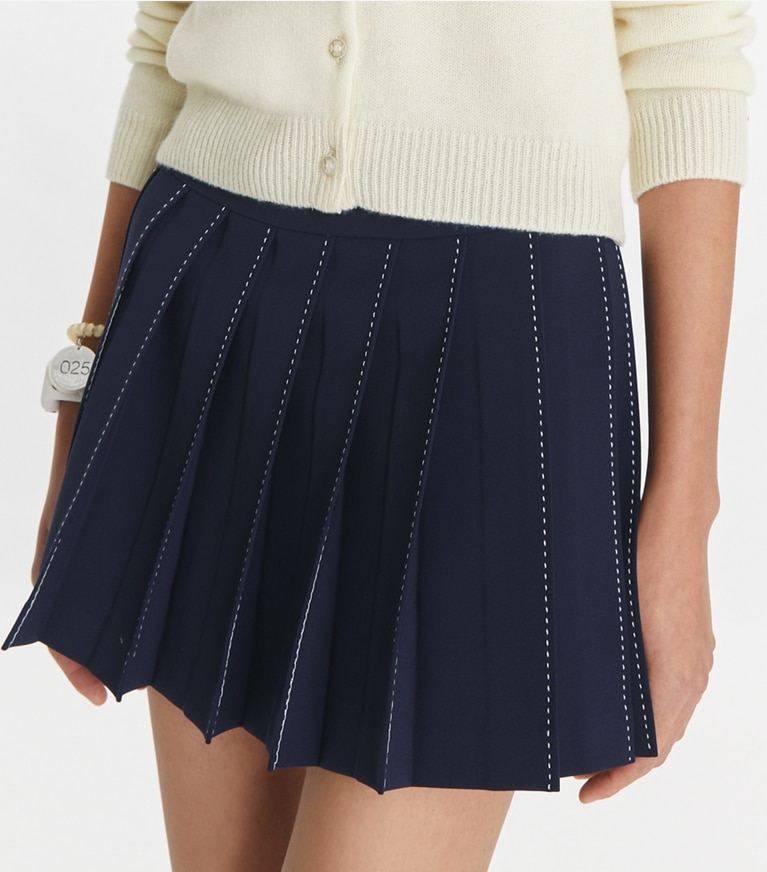 Tory Sport designer bottoms Pickstitch Pleated Skirt in Tory Navy front