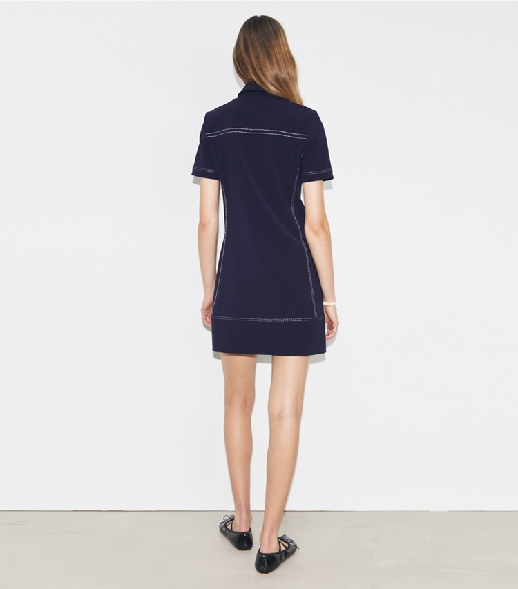 Tory Sport designer dresses Pickstitch Stretch Polo Dress in Tory Navy on model back