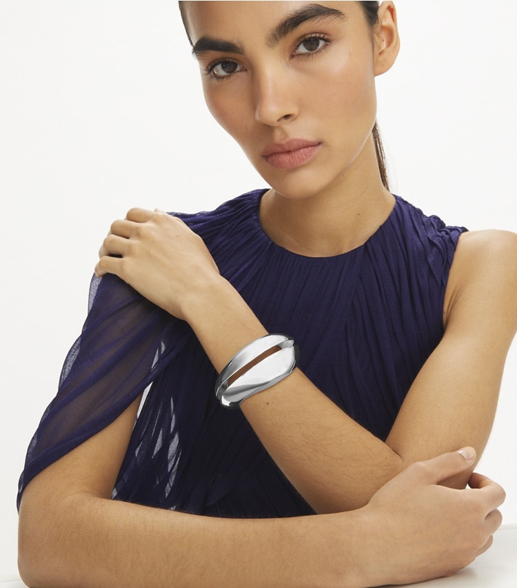 Tory Burch designer bracelets Pierced Cuff in Light Brass accessory on model