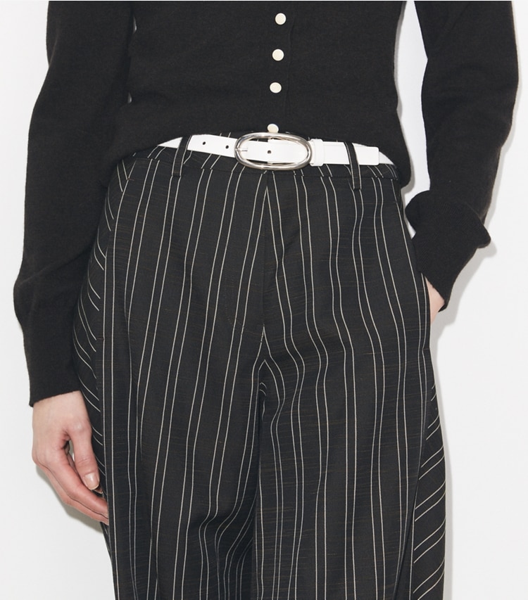 Tory Burch designer belts Pierced Large Buckle Belt in Bianco accessory on model