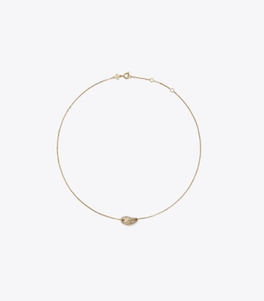 Tory Burch designer necklaces Pierced Pavé Pendant Necklace in Light Brass / Crystal front