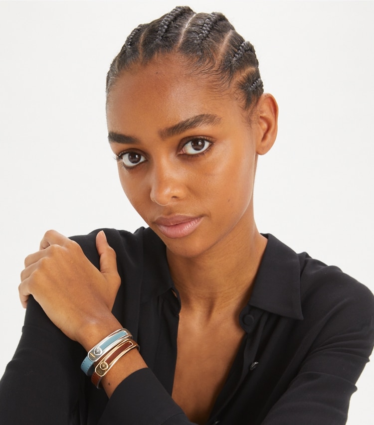 Tory Burch designer bracelets Pierced Slider Bracelet in Tory Gold / Pink Snow accessory on model