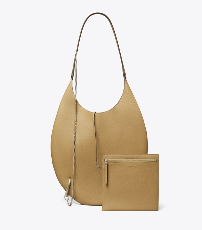 Tory Burch designer shoulder bags Pierced Soft Bag in Light Sand angle