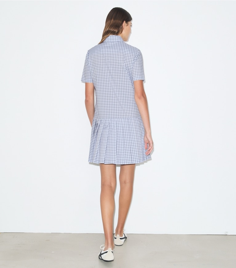 Tory Burch designer dresses Plaid Drop-Waist Pleated Golf Dress in Light Blue Plaid on model back