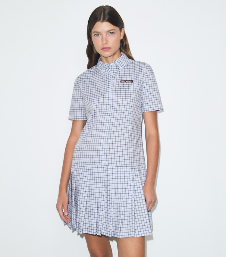 Tory Burch designer dresses Plaid Drop-Waist Pleated Golf Dress in Light Blue Plaid on model detail