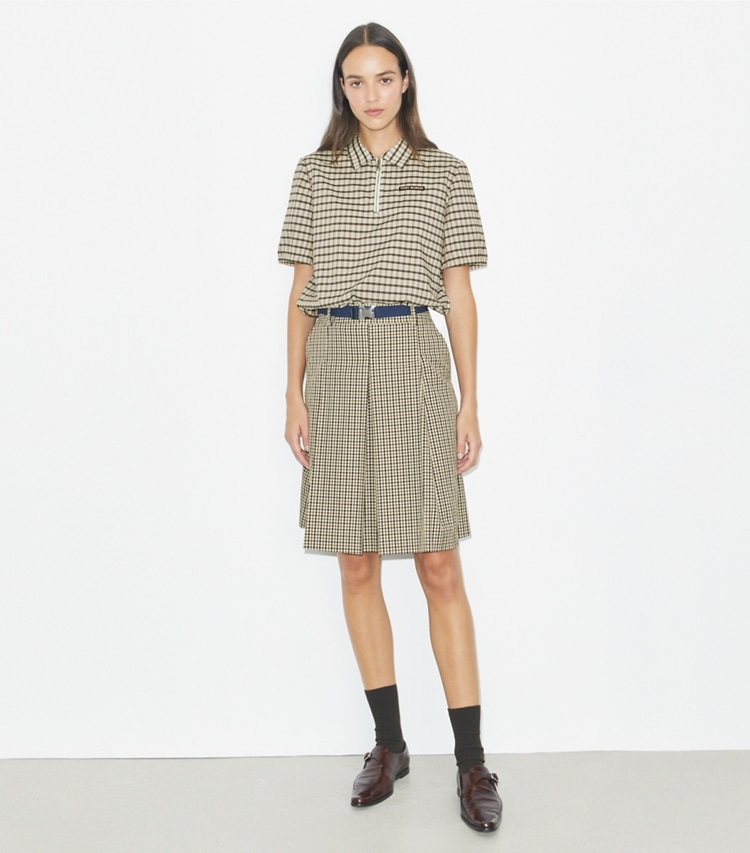 Tory Burch designer tops Plaid Half-Zip Polo in Ivory / Black Plaid on model front